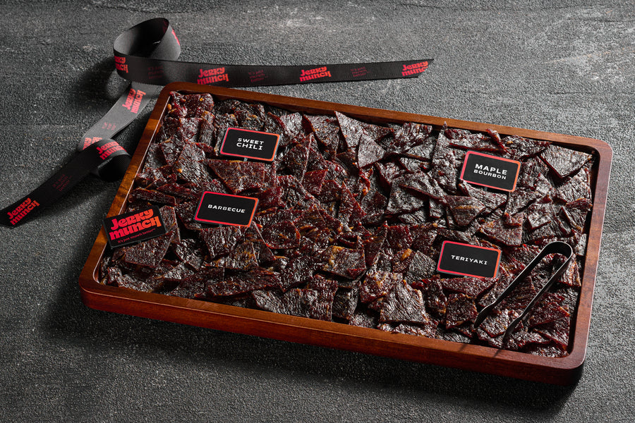 Jerky Munch meat board with labeled kosher beef jerky flavors